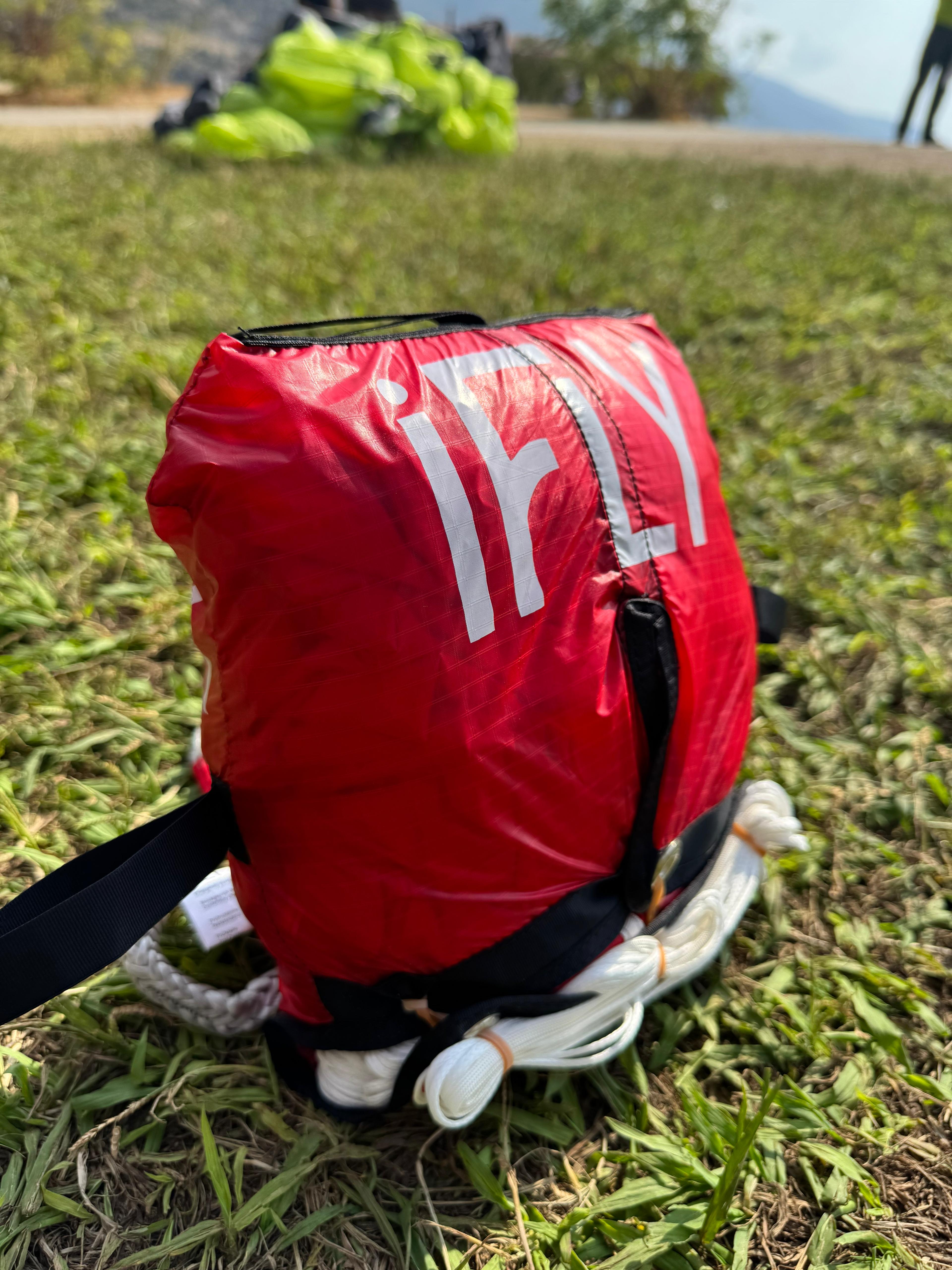 Round red parachute.